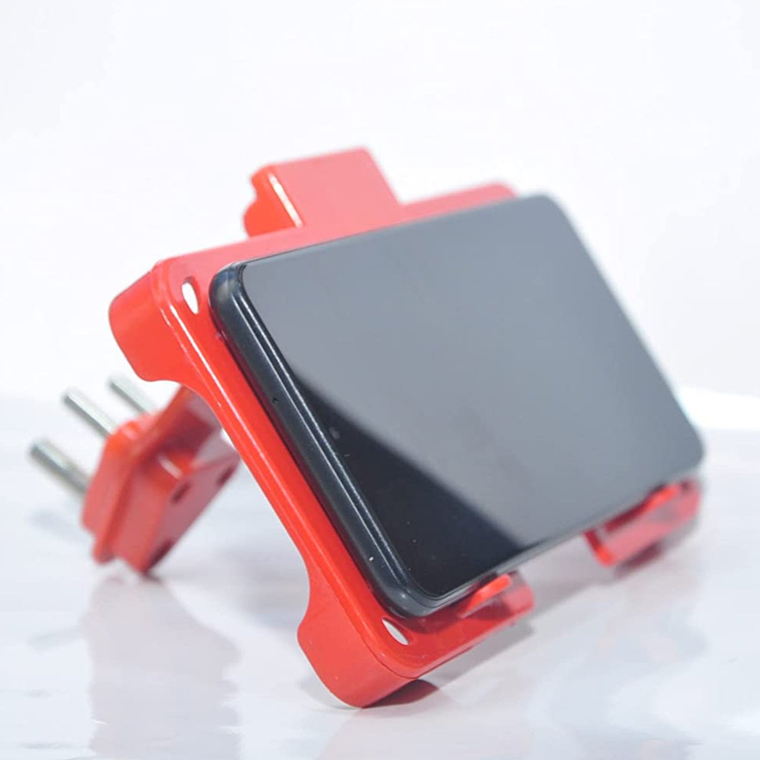 6496 Multi-Purpose Wall Holder Stand for Charging Mobile Just Fit in Socket and Hang (Red) DeoDap 6496 Multi-Purpose Wall Holder Stand for Charging Mobile Just Fit in Socket and Hang (Red) DeoDap